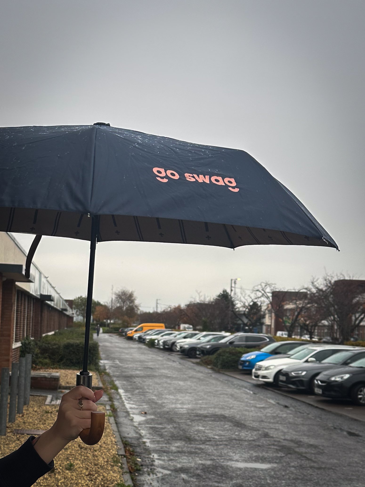 Go Swag navy umbrella in use